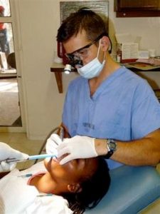 dentist working on child's teeth