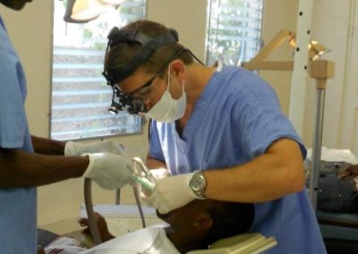 Dentist Working on La Gonave child
